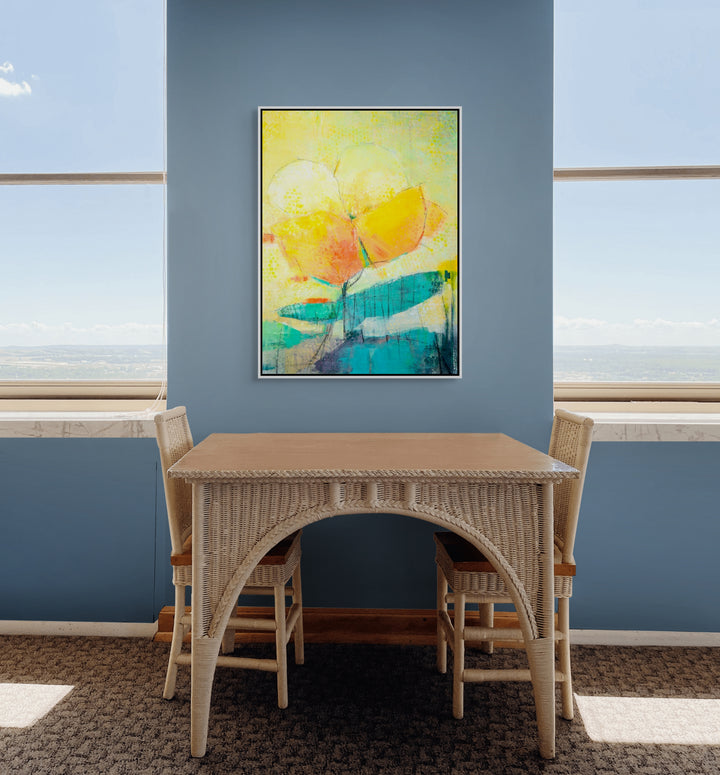 Interior room with a blue wall with a floral painting for sale.