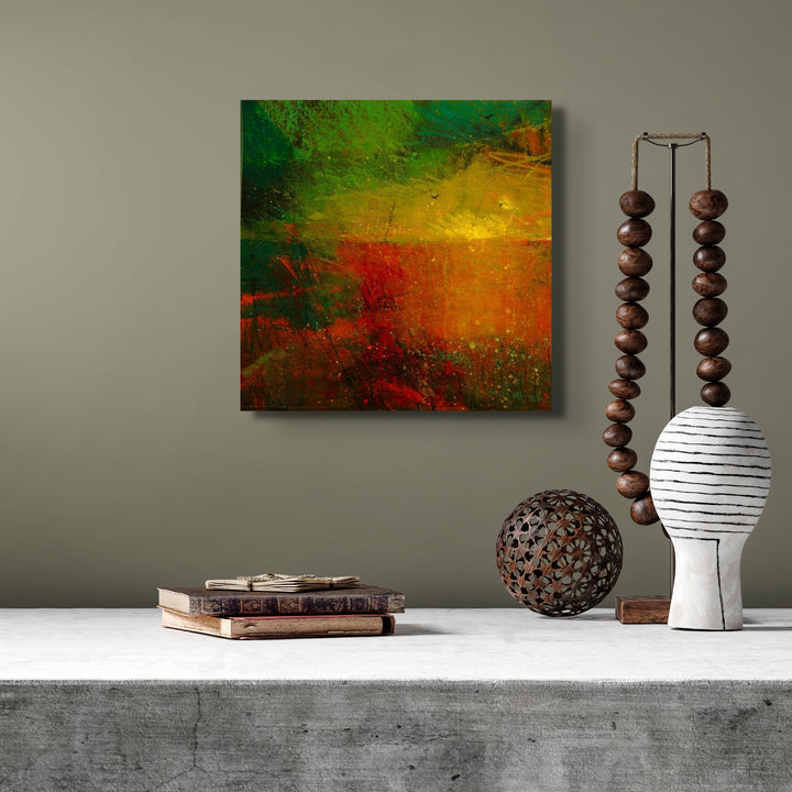 Red abstract painting on a wall.
