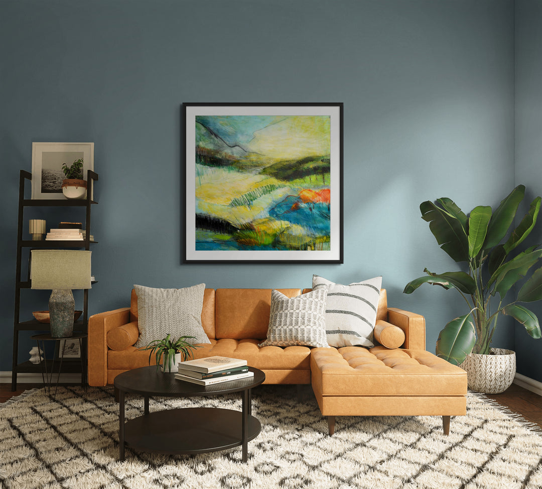 Living room with large landscape wall art.