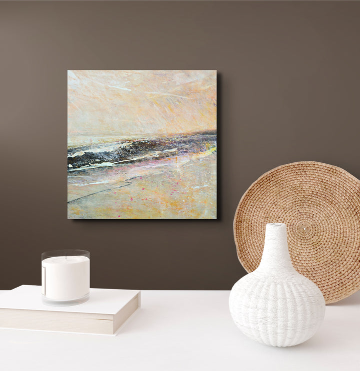 Pink coral and brown abstract beach painting on a wall .