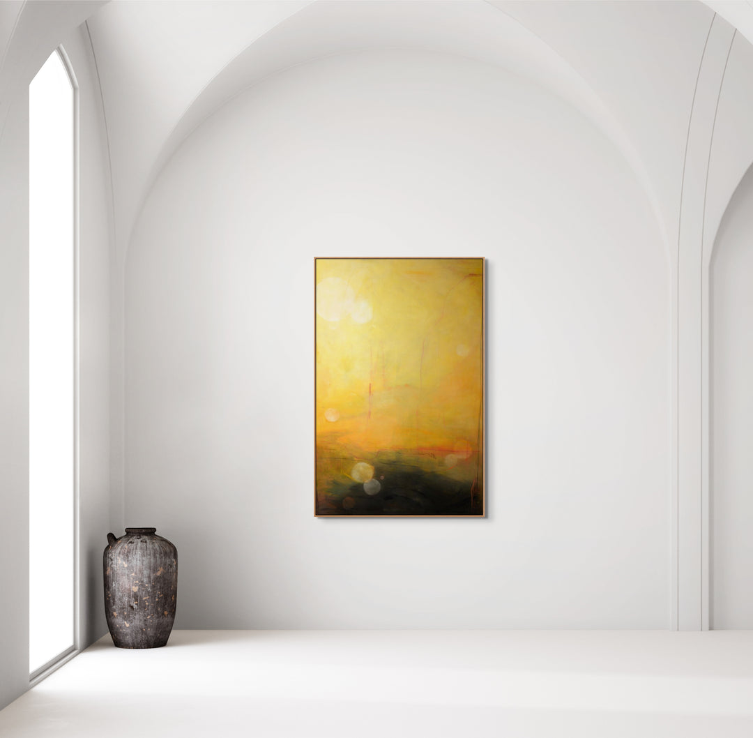 Abstract yellow vertical rectangular painting on a white wall.