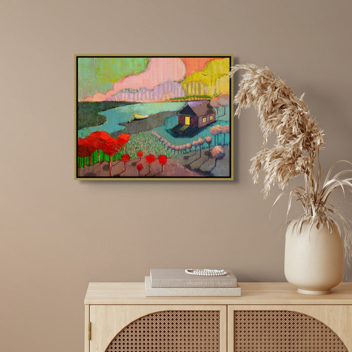 Framed colorful oil painting on a wall .